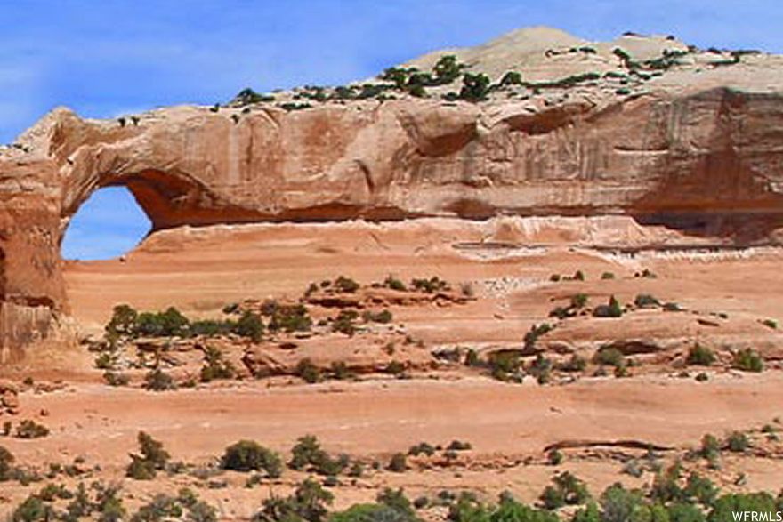 UNDER THE ARCH! This commercial lot is set directly next to Wilson Arch offering a great opportunity for a tourist destination shop.  This parcel also offers the opportunity for a few casitas, retail, coffee shops, small grocer, and cafes, should these work with the terrain and design standards.  There are multiple commercial lots in Wilson Arch Resort that are also available to expand your commercial opportunities! Fantastic stop-over midway between Moab and Monticello- on the way to Indian Creek and Canyonlands National Park, in the heart of the Four Corners Region!