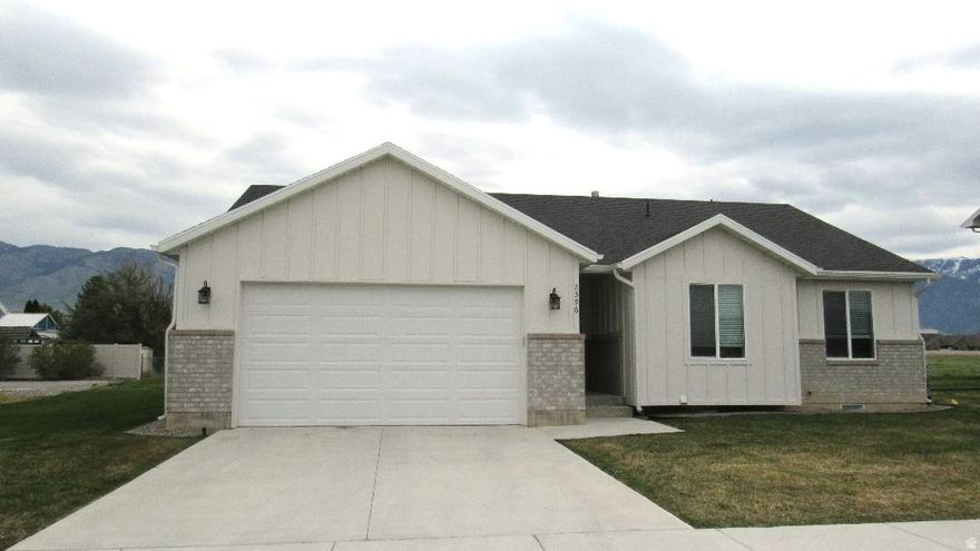 Enjoy comfortable, single level living in this well maintained 3 bedroom, 2 bath home located in desirable North Logan. This property features granite countertops throughout, open layout and mountain views.  Conveniently located near a medical center and hospital, elementary school, and shopping. Square footage figures are provided as a courtesy estimate only and were obtained from Appraisal.  Buyer is advised to obtain an independent measurement.