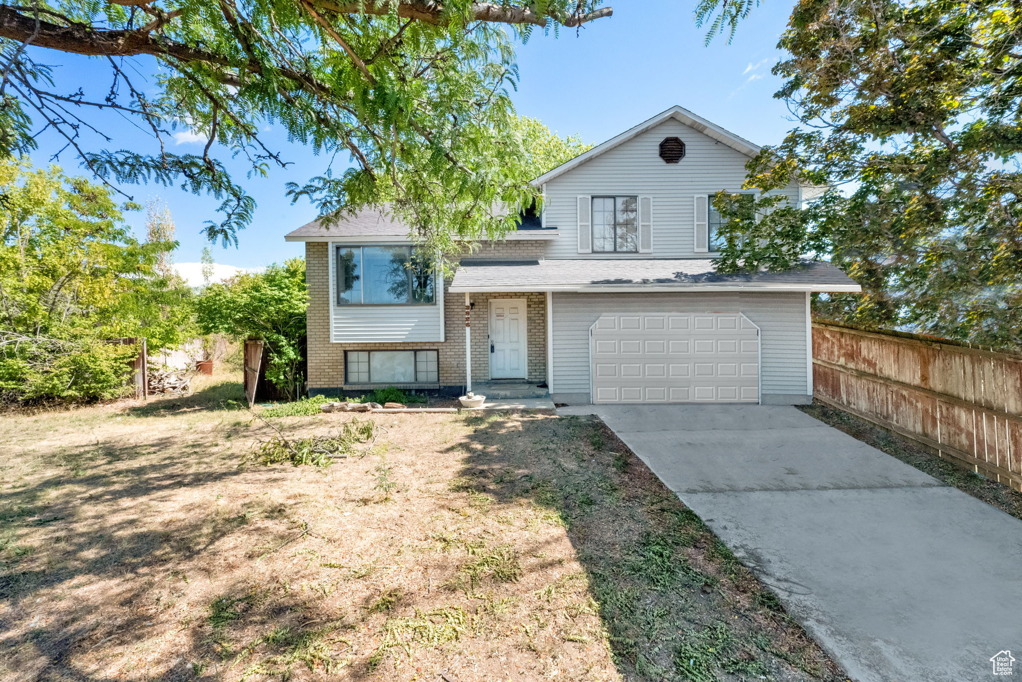 This cute home in an amazing neighborhood is ready to be made into the perfect family home! The location is excellent, on the east side of Layton and close to everything you need! It is a straight forward remodel for the family who wants to build equity in their home, or a great project for an investor or handyman. Unlock the potential here with some TLC! All the bones and building blocks are in place, it just needs you! Sold as-is. Owner Agent.