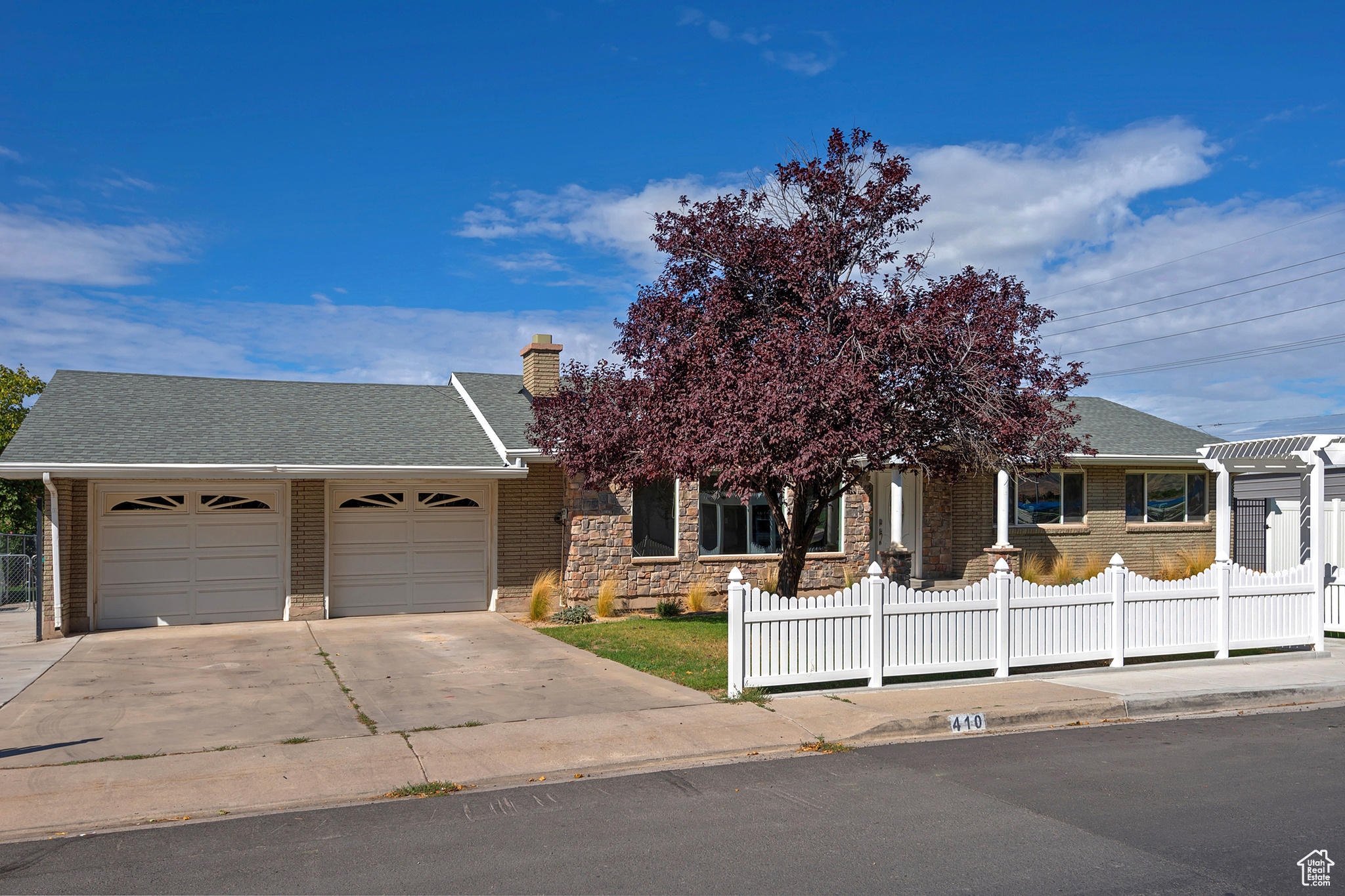 Amazing Rambler located in a desirable location! Just across the street from a park with easy access to Front Runner, shopping, restaurants, and entertainment. This home sits on a .39-acre, fully fenced lot with a covered patio, a large two-car garage, and a welcoming curb appeal. Inside, you'll find five bedrooms and three bathrooms and nearly 3,000 square feet of open living space. The layout features large rooms, vaulted ceilings, and abundant natural light, creating an airy and inviting atmosphere throughout. Whether you're entertaining family and friends or enjoying quiet evenings at home, this residence provides versatile living areas and ample storage. A thoughtful blend of comfort and practicality, this property is perfectly suited for extended families, multi-use spaces, or a bustling household that loves to host. Don't miss the opportunity to make this exceptional rambler your new home.