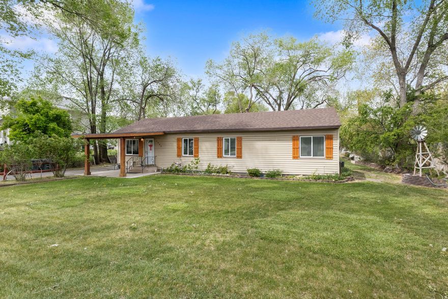 Enjoy the best of both worlds-convenient city living with the peaceful feel of the countryside. Nestled on 0.56 acres, this charming horse & animal property offers space, privacy, and endless possibilities. There's plenty of room for RV parking, outdoor living, and future growth.  Inside, the home has been beautifully remodeled with thoughtful updates throughout, including the addition of a convenient half-bath and a versatile bonus room with a pellet stove-perfect for a home office, den, or cozy retreat. New electrical, plumbing, HVAC, windows, etc.  The home was taken clear down to the studs and rebuilt!  The roof 6 years ago. A recent appraisal gave the home a 1940 + 85 years meaning, it's as good as a 2025 recent build.  Step outside to a spacious back deck ideal for entertaining, whether you're hosting summer BBQs or relaxing under the open sky. Just beyond the garage, you'll find an additional covered patio area, perfect for gatherings or quiet evenings. The property also includes a well & pump house keeping irrigation costs low while supporting all your gardening, landscaping, and animal needs. There is also a plum tree and garden area.   This unique property combines comfort, flexibility, and a touch of rural charm-ready to welcome you home.   Contact WVC Zoning for the number of permitted animals - 801-963-3282