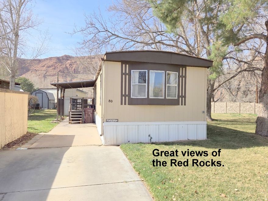 Affordable home in Moab. Just 5 blocks from Main St. located in the nicest Manufactured Home Park in Moab (Grand Oasis). This comfortable 2-bedroom 2-bathroom home has an easy living layout with bedrooms on either end of the home for privacy. Some furniture is included in this sale for the convenience of the buyer. Queen bed, couch, washer, dryer, stove, refrigerator, metal shed.  Large shade trees on the west side of the home keeps the home cooler during the hot summer days. Your children will enjoy the playground area, the basketball court and the outdoor swimming pool. An exercise Gym is available for adults. Secure mail boxes, 24 hr. on site laundry facility, and a club house for entertaining your large groups of friends or family get-together events. A park approval and reference application is required for all Grand Oasis home owners. Call or go on line to fill out these applications. The home owner is still living in the home until April-6-2026, so a 24 hr. notice is required for all showing.  All information herein is deemed reliable but is not guaranteed. Buyer is responsible to verify all listing information, including square feet and acreage, to buyer's own satisfaction. Square footage figures are provided as a courtesy estimate only and were obtained from county records. Buyer is advised to obtain an independent measurement.