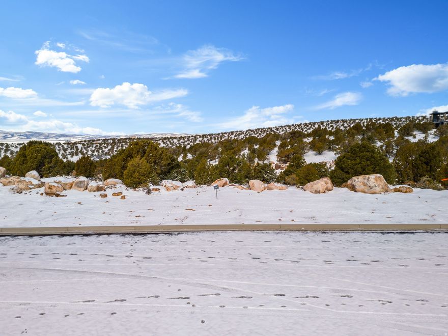 This is Lot Number 18, a 0.61-acre homesite located in the highly sought-after Estates at South Mountain subdivision. Enjoy stunning views of Shurtz Canyon and the surrounding Southern Utah mountains. This growing community is positioned near planned future elementary, middle, and high schools, adding long-term value and convenience. Bring your own builder or choose to build with the South Mountain Development Group. Don't miss this opportunity to secure a premium lot in one of Cedar City's most desirable neighborhoods. No HOA.