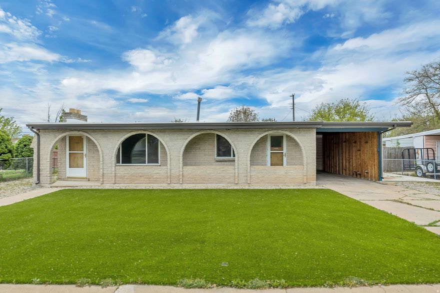 This 3-bedroom, 1.5-bath home is move-in ready with stylish updates throughout, including updated bathrooms, new cabinets, countertops, appliances, flooring, paint, and light fixtures. The functional 1,088 sq ft layout offers easy, single-level living. Enjoy peace of mind with a newer roof and furnace, plus low-maintenance turf in the front yard for great curb appeal year-round. The backyard provides plenty of space for entertaining, pets, or future possibilities.   Square footage figures are provided as a courtesy estimate only and were obtained from county records.  Buyer is advised to obtain an independent measurement.