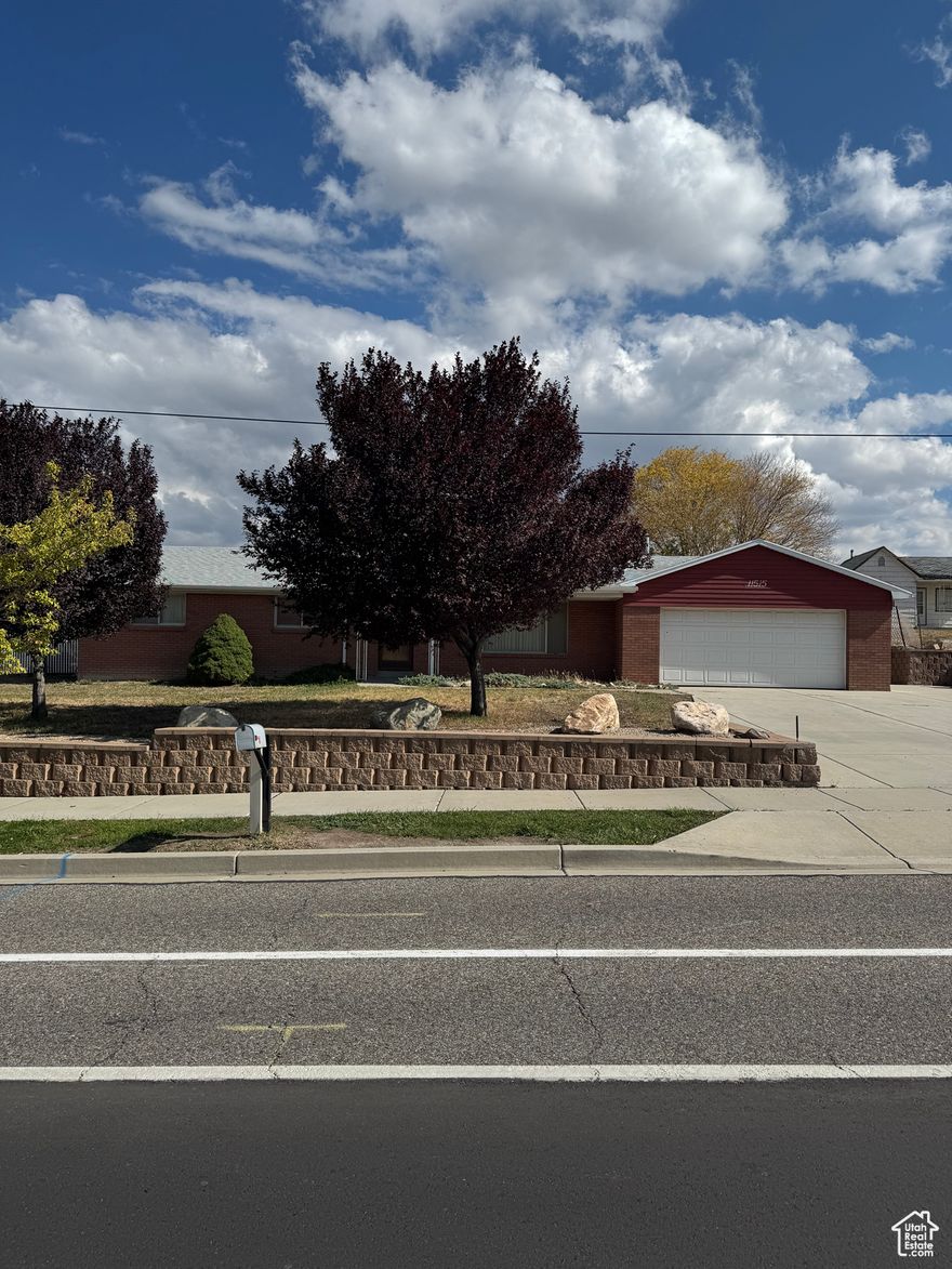 Incredible opportunity to own a home in South Jordan on a 1.3 acer lot. Great Mnt Views and a large six bay shop. Currently the lot has the potential to add a flag lot (Buyer to verify with city). Home is sold is. Sq/ft provided are estimates,buyer verify