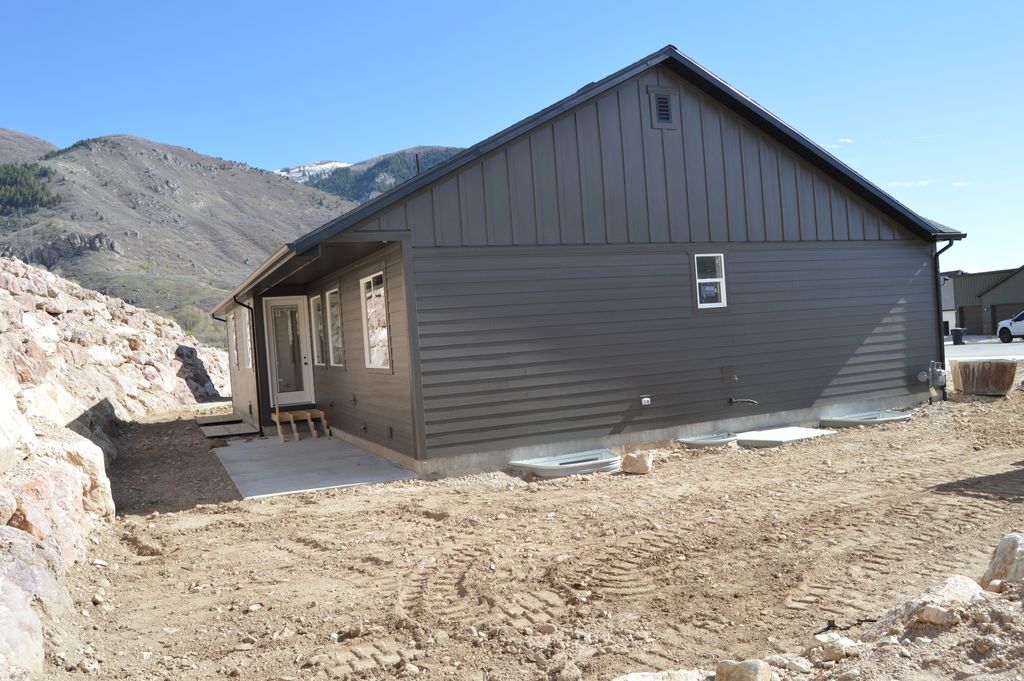 Photo of 3038 N MOUNTAIN RD #215, North Ogden, UT 84414 (MLS # 2146188)