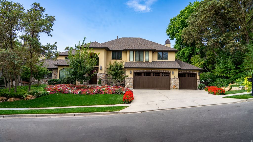 Photo of 3450 E HIDDEN OAK DR, Salt Lake City, UT 84121 (MLS # 2140998)