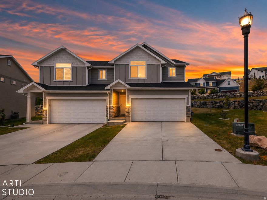 Get ready to enjoy affordable mountain living in Utah with majestic views in every direction, all in an incredible location. This desirable end-unit townhome is move in ready now and stands above the rest having been exceptionally maintained, fresh paint, super clean, and a condition that feels better than new.  The main level features an open-concept great room and kitchen with has beautiful wood cabinet providing ample storage, quartz countertops, gas range, a convenient half bath, and access to the spacious two-car garage, as well direct access to the patio and backyard which has been professionally landscaped and enhanced with large natural rock boulders.  Upstairs, you'll find three bedrooms, two full bathrooms, and a large laundry room. The spacious primary suite includes a large private bath and a walk-in closet.  The HOA provides easy, low-maintenance living so you can spend more time enjoying Utah's outstanding outdoor recreation, including nearby trails, camping, skiing, and fishing.  Relax at home in this quiet community, yet you can still enjoy conveniently quick drives to Park City, Hill Air Force Base, and cities Wasatch Front.  The HOA allows long-term rentals, but short-term rentals are not permitted.