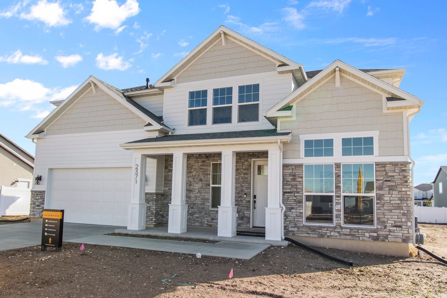 This is a TO BE BUILT listing. The Redwood floor plan features 3 bedrooms, 2.5 bathrooms, and abundant open and airy space to call your own. The exterior showcases a porch with beautiful columns and attractive architectural styles available to suit your preference. A flex room off the main entry provides the perfect space for an office or playroom and a mud room makes it easy to organize shoes, bags, and more for trips outside.  Past the entry, step into the open-concept layout of the main living area and kitchen, featuring large windows for abundant natural light. The upstairs features a spacious loft, 3 bedrooms, and two bathrooms. Also enjoy the beautiful primary bedroom with a massive walk-in closet and beautiful primary bathroom. Additionally, enjoy the unfinished basement and its potential for more rooms.