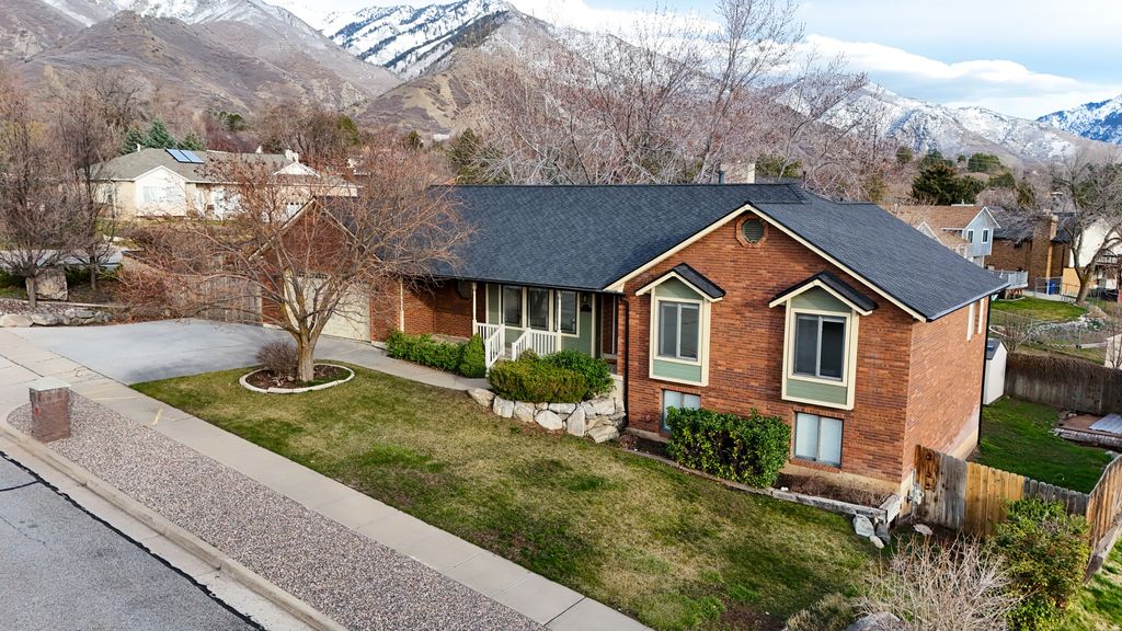 Photo of 1443 E WASHAKIE CIR S, Ogden, UT 84403 (MLS # 2141166)