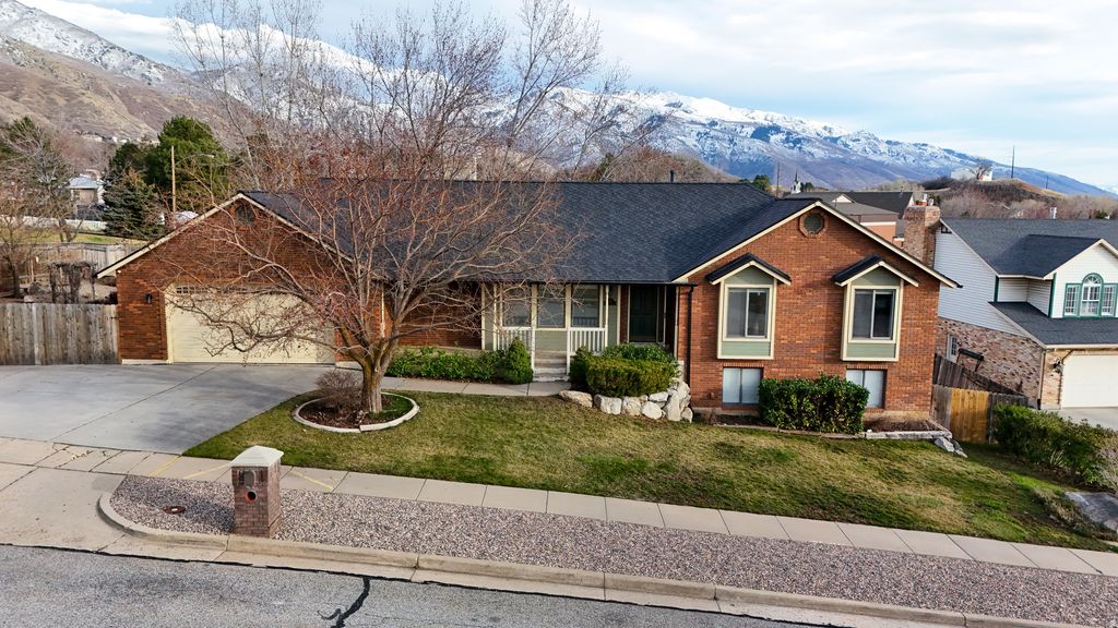 Photo of 1443 E WASHAKIE CIR S, Ogden, UT 84403 (MLS # 2141166)