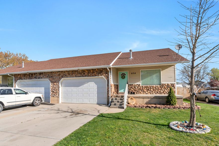 Welcome home to this spacious and open twin home in Payson! Offering the perfect blend of comfort and functionality, this property features a rare combination of a 2-car garage, RV parking, and a huge backyard-giving you the space you've been looking for both inside and out.  Step inside to an open-concept layout with a large kitchen, dining area, and great room-ideal for everyday living and entertaining. The home offers 3 bedrooms and 2 bathrooms, including a comfortable primary suite. You'll also love the convenience of a mudroom and main-floor laundry with an added half bath.  With no HOA and plenty of room to spread out, this home provides flexibility, value, and the lifestyle you want-all in a great location.