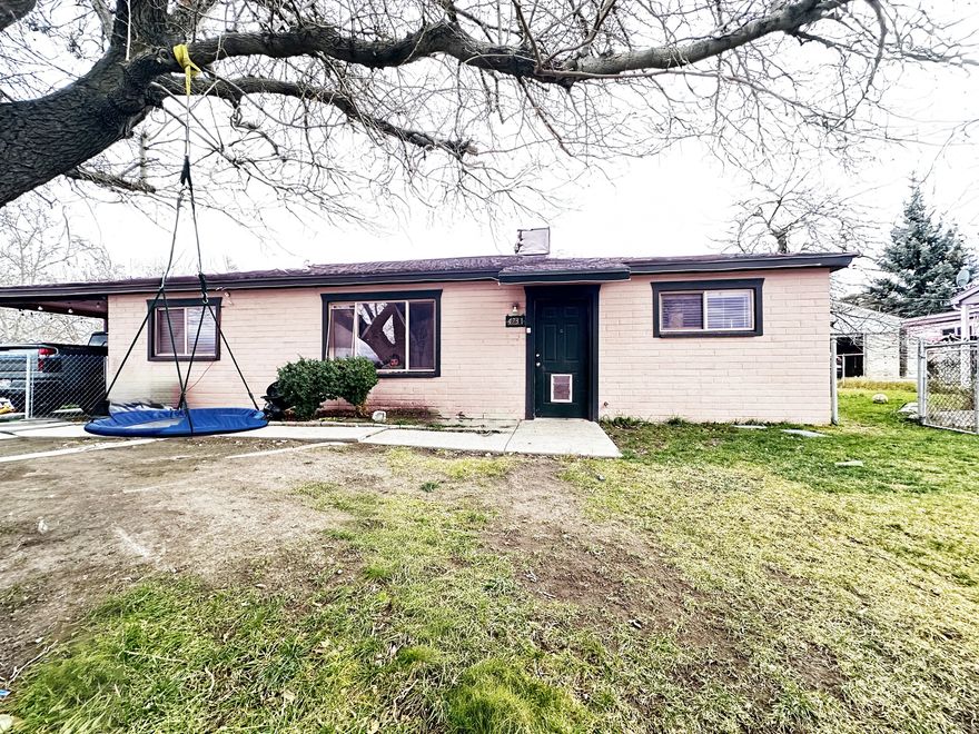 Perfect starter home centrally located on a large corner lot with beautiful side landscaping. Freshly painted with a fully fenced yard.  Square footage figures are provided as a courtesy estimate only and were obtained from county records.  Buyer is advised to obtain an independent measurement.