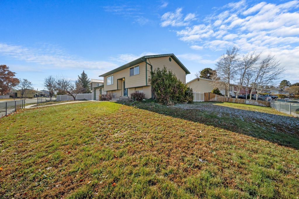 Photo of 4402 S WORMWOOD DR W, West Valley City, UT 84120 (MLS # 2125141)