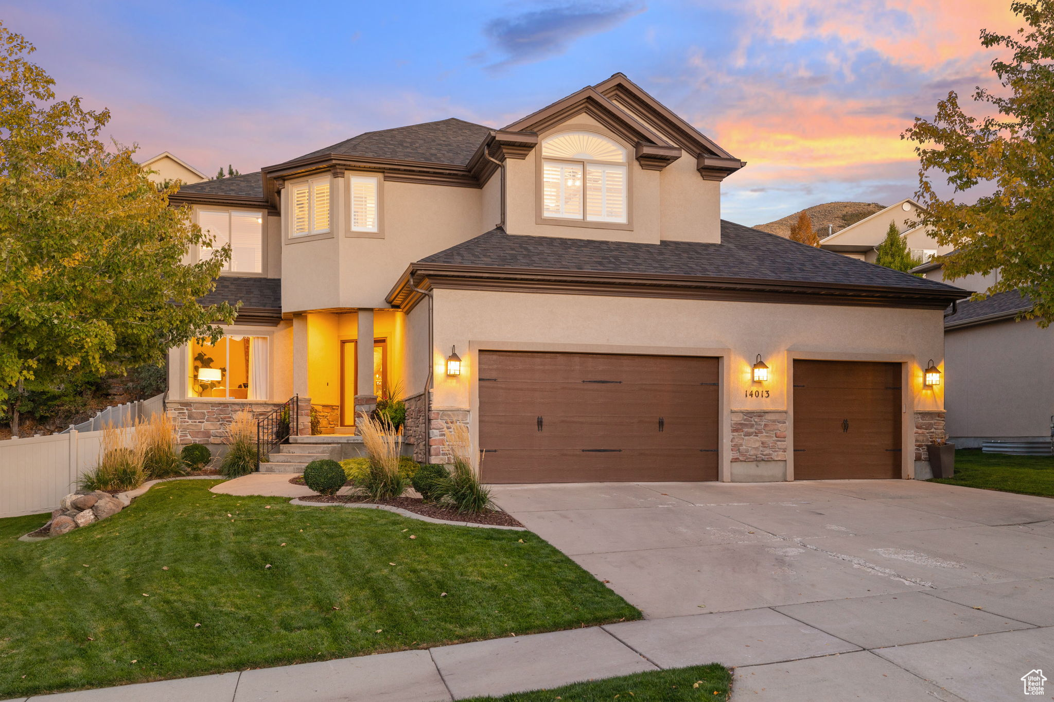Welcome to a Draper home where timeless design meets modern refinement. Completely updated from top to bottom, this residence exudes style, comfort, and sophistication. The main level showcases rich hardwood floors, fresh designer paint, and an open-concept floor plan that flows seamlessly between the living, dining, and kitchen areas. Every inch has been thoughtfully curated with high-end finishes that elevate everyday living. Upstairs, you'll find four spacious bedrooms including a luxurious primary suite featuring a spa-inspired bathroom and an expansive walk-in closet. The fully finished basement adds two additional bedrooms, a full bath, and a large second living area perfect for movie nights, game days, or guests. With brand-new carpet, designer lighting, and custom details throughout, the home feels both new and warmly inviting. Step outside to a private, beautifully landscaped backyard designed for connection and relaxation, complete with a gas hookup for an outdoor fireplace and BBQ; the ideal setting for entertaining under the Draper sky. Situated just minutes from South Mountain Golf Course, scenic hiking trails, and Draper's best dining and shopping, this home also lies within the prestigious Corner Canyon High School district, one of the highest-rated in the state. Combining elegant updates, functional living, and a premier location, this Draper gem offers the complete package for today's discerning buyer.