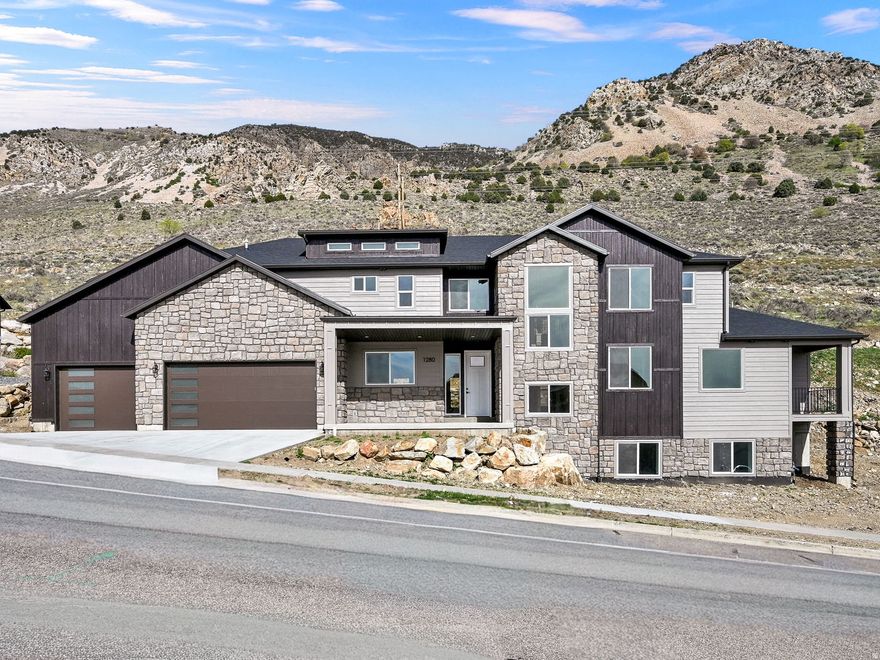 What a beautiful new construction home ready for its owners! This home has so many amenities, you don't want to miss out. Stainless steel appliances, butler's pantry with sink and space for additional refrigerator, luxury vinyl flooring throughout, sink in laundry room, beautifully tiled master bath with separate soaker tub and shower with frameless glass. The master suite boasts a large walk-in closet, a personal balcony, and a walkout on to the patio with gorgeous mountain views. Don't miss out on this beautiful mountain home.