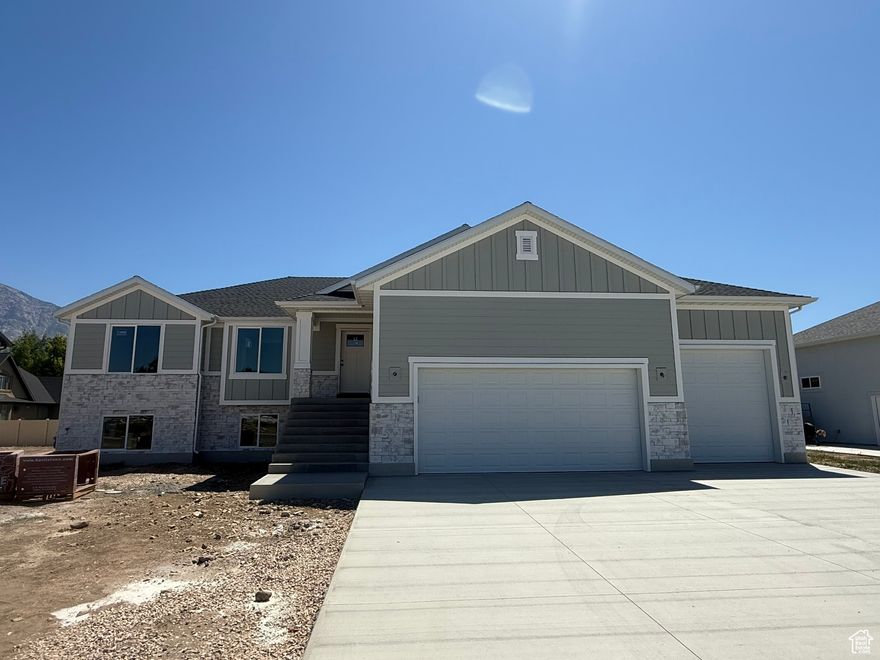 Stunning brand new 5-bedroom, 3 bath home on a spacious 1/3 lot! Features include custom cabinets, quartz countertops, cozy fireplace, and oversized 3 car garage. Enjoy room to grow with a full walk-out basement. A perfect blend of style, space and comfort!