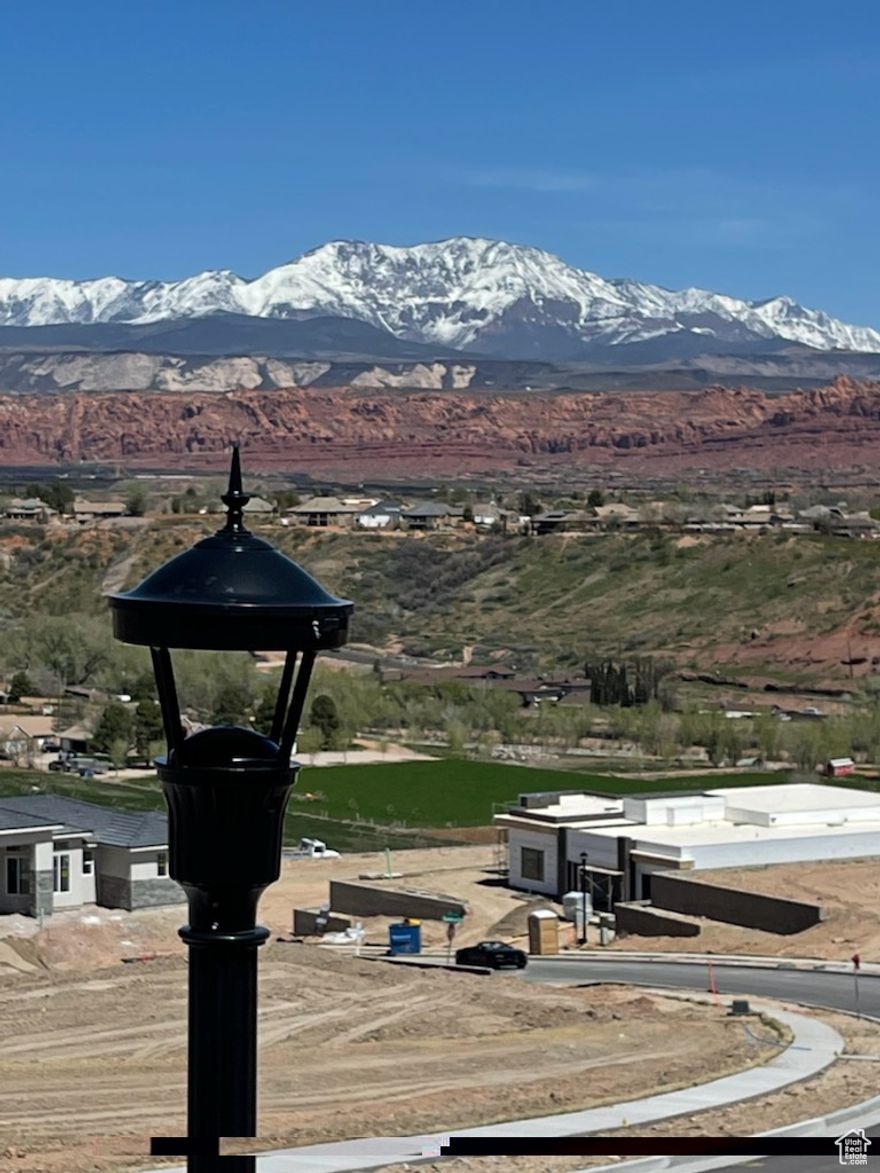 Seller Financing potential. No HOA. Hilltop with scenic views of Snow Canyon red mountains.  The highest lot in the subdivision. One of few lots allow a two-story build. Next to BLM land. Minutes from Black Desert Resort 36-hole PGA golf course in Ivins.