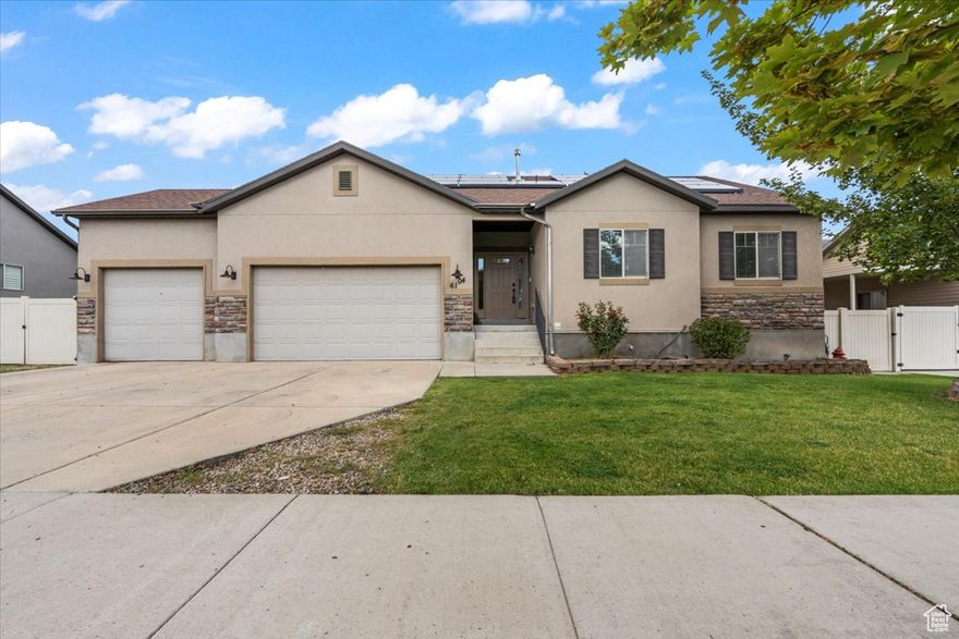 This property features a fully finished mother-in-law basement that can generate approx. $2,000 mo in rental income, perfect to offset your mortgage. Enjoy the spacious 3-car garage, solar panels for energy savings, and a smart layout built for both comfort and flexibility. Conveniently located near Hillside Elementary, and Hunter High, plus quick access to I-215 & Mountain View Corridor, for easy commuting. Shopping, dining, and entertainment are all minutes away, including Valley Fair Mall, Smith's, Walmart, Target, and more.  This home truly has it all! For those who love to entertain, the backyard features a cozy fireplace, spacious deck, and built-in bar area-ideal for summer cookouts and year-round gatherings. You'll also enjoy ample parking with an RV pad and a large storage shed, perfect for tools, equipment, or recreational gear.