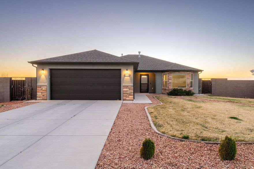 If you're looking for a newer home with land, space, and a quiet Enoch location, this property is definitely worth a look. Built in 2018 and located in The Ridge subdivision, this single-level home sits on a large 0.41 acre lot with a spacious backyard that offers room for RV parking, a future shop, garden space, or outdoor entertaining. The open layout creates a comfortable flow between the living room, kitchen, and dining area, making the home feel bright and welcoming.  The home features 3 bedrooms, 2 bathrooms, a 2-car garage, stone and stucco exterior, fireplace, natural gas, city utilities, and central air. The yard is partially landscaped with an automatic sprinkler system and offers plenty of room to expand, customize, or simply enjoy the extra elbow room that larger Enoch lots provide. Located in a quiet neighborhood just a short drive from Cedar City, this home offers the space and setting many buyers are looking for but don't often find.