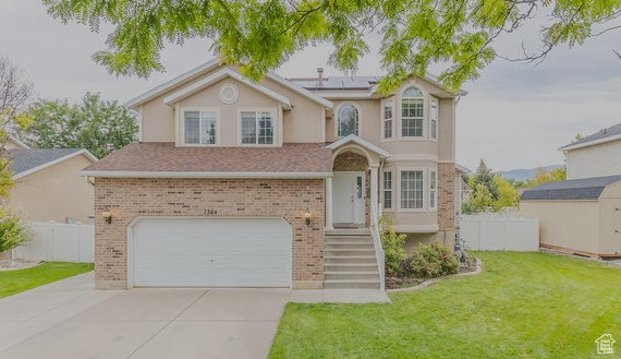 Enjoy comfortable living in this stunning 5-bedroom home located in the desirable Woods Cross area. This house sits just minutes away from two freeways, front runner, Legacy Highway, a short 7 minute drive to downtown SLC and 12 minutes to the airport and so many amenities making it perfect for someone seeking space AND convenience. This house offers an open floor plan with an updated kitchen boasting granite countertops and a gas range, a nice wood burning stove in the family room for those colds night when you want to cozy in and first floor laundry. Upstairs you will find 4 bedrooms including the large Primary Suite and attached bathroom. Need more space, this house has got it. There is a finsihed basement with another bedroom and large family room perfect for gathering, storage or whatever you desire...or you can make it an ADDITIONAL bedroom. The yard comes with the chicken coop AND chickens if you want, or the seller can take it all with them. Other items of note: Solar panels are equipped with a switch that automatically provides power to five essential areas of the home during a power outage 1.Fridge, 2.Freezer in Garage- Plug next to wood shelf, 3. Master Bedroom, 4. Bedroom in Basement (office right now), 5. Microwave. The roof was replaced in 2021, AC/Furnace was replaced in 2025, google fiber and comcast available, large safe in the primary closet is staying and there are 6 fruit trees in the backyard. If you are looking for a friendly, convinient neighborhood where you can plant roots and start fresh, look no further, YOU HAVE FOUND IT HERE! Call to schedule a tour, fall in love and make us an offer. Buyer to verify all
