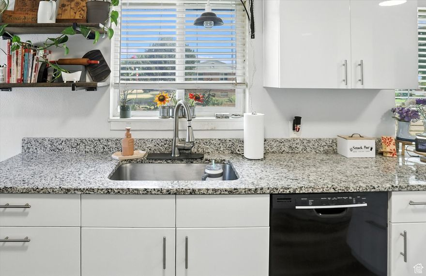 *Motivated Sellers* Sellers are offering $5,000 in closing costs! Don't miss this 5-bedroom rambler tucked away in a quiet Clearfield cul-de-sac. Enjoy a modern kitchen, tons of storage inside and out, renovated bathrooms, including a step-in shower upstairs with grab bar, and downstairs, a jetted tub that maintains its heat. Newer water heater and furnace. This home would be great for multi-generational living or families that need to spread out. Great location near parks, I-15, HAFB, and shopping: affordable, move-in ready, and full of value! New carpet to be installed in bedrooms on 10/30 and solar WILL be paid off at closing.