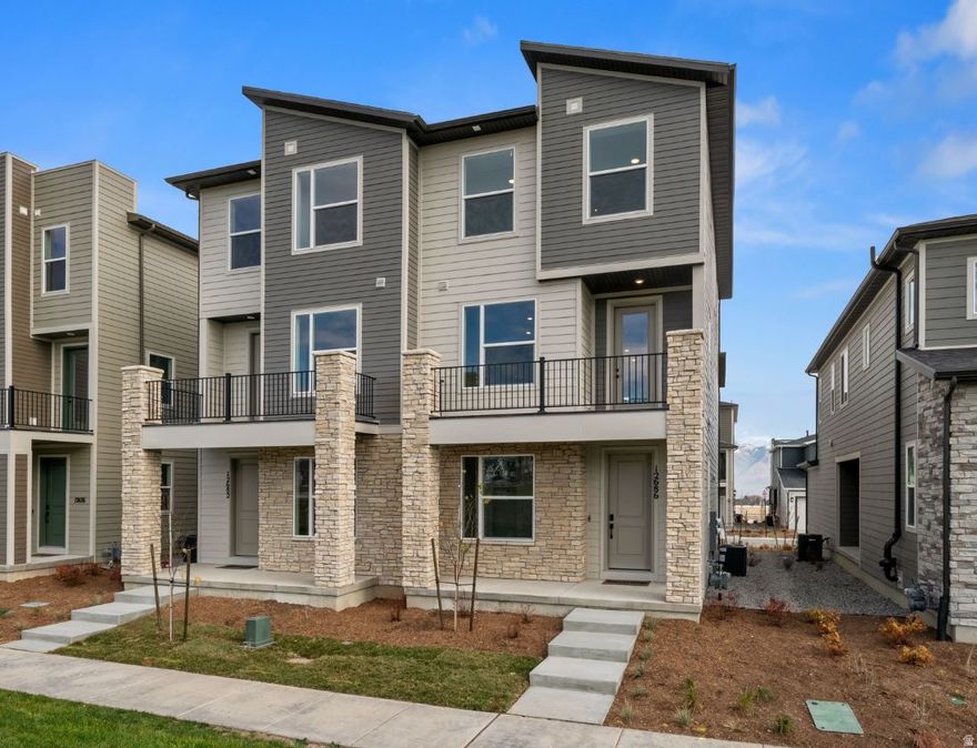 ***NEW COMMUNITY***COME AND TOUR TODAY***The Brooklyn plan greets guests with a charming, covered porch and continues to impress with an open kitchen featuring a pantry, center island and adjacent dining room. The main floor also offers a powder room, an inviting living room, a covered patio with center meet sliding glass doors, and a 2-car garage. Upstairs enjoy 9ft ceilings and 8ft doors, a convenient laundry and three generous bedrooms, including a lavish master suite with an immense walk-in closet and private bath with double sinks. Designer curated finishes complete this semi-luxury home with quartz countertops throughout home and lvp flooring on main areas. Minutes away from shopping, food, entertainment, schools.  Amenities' include a large playground, pickleball courts, bathrooms, and a large field.  Buyer to verify square footage.  Call us today at 801-545-3429