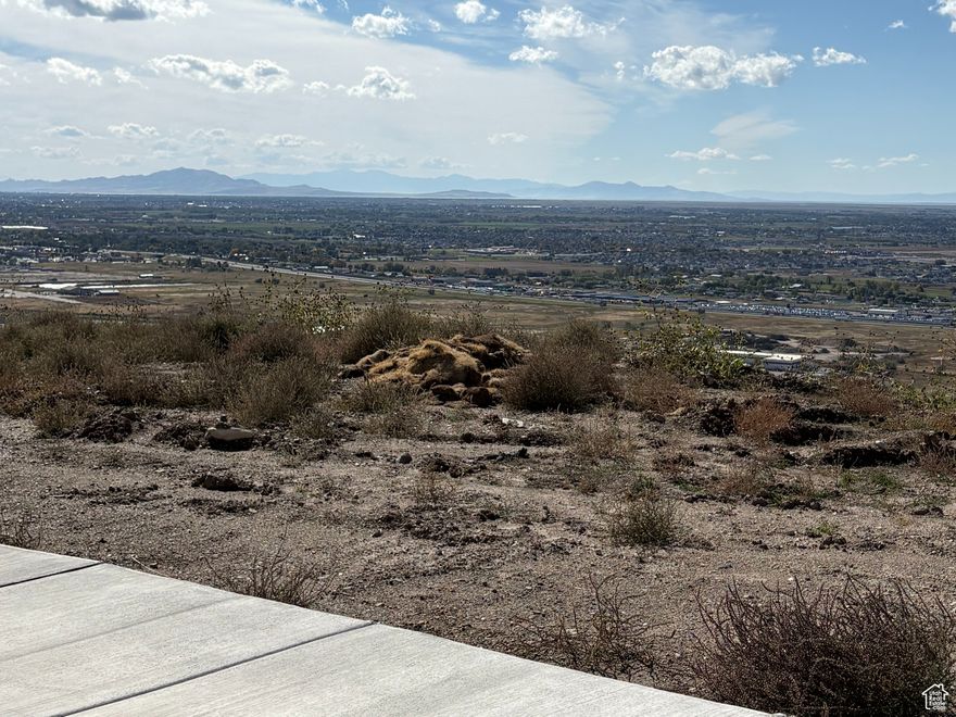 Nestled High on the Beautiful Pleasant View Bench, this stunning 0.50-Acre CORNER LOT! showcases sweeping panoramic  Mountain and valley views along with breathtaking sunsets. The property offers the perfect setting for a custom home designed to highlight the area's natural beauty and serene surroundings. Enjoy the peaceful atmosphere while being just minutes away from hiking trails, skiing, parks, and local conveniences. this rare view lot provides an exceptional opportunity to build your dream home in one of Pleasant View's most desirable locations.
