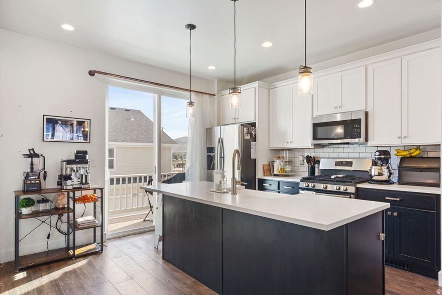 SELLER IS OFFERING $10k toward CLOSING COSTS or RATE BUY DOWN when you use our preferred lender. Enjoy multi-level living with the added benefit of a two-car garage. This prime location offers easy freeway access between Utah and Salt Lake County. Tall ceilings and well-placed windows bring in consistent daylight without sacrificing wall space for art and furniture. Durable, low-maintenance flooring ties public spaces together for a cohesive look that withstands heavy traffic. Deep, under mount kitchen sink with quartz countertops. Both upstairs bedrooms are en suite. Finish the bathroom on the main and have a rentable room and bath.