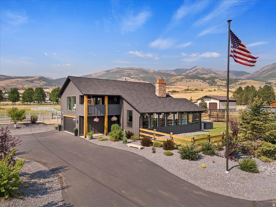 Set on over an acre in the heart of Ogden Valley, this property isn't just a house-it's a fully built-out lifestyle. Thoughtfully redesigned four years ago, every inch of this home and property has been dialed in for simplicity, efficiency, and adventure. Inside, the home offers 4 bedrooms and 3 bathrooms with a clean, updated feel that balances comfort and function. But what truly sets this property apart begins the moment you step outside. Anchoring the property is a massive 40x60 shop, offering expansive garage space along with a fully finished gym space and sauna. It's a setup that's hard to recreate and even harder to find, built for those who want space to work, train, and live all in one place. The land itself opens up endless possibilities. With pasture space for animals, custom timber fencing, mature trees, and a private pump track, this property invites you to slow down, spread out, and enjoy the lifestyle Ogden Valley is known for. Evenings are best spent in the shaded backyard or gathered around the fire pit with unobstructed views stretching toward Nordic Valley. This isn't your typical Ogden Valley home. This is your basecamp.