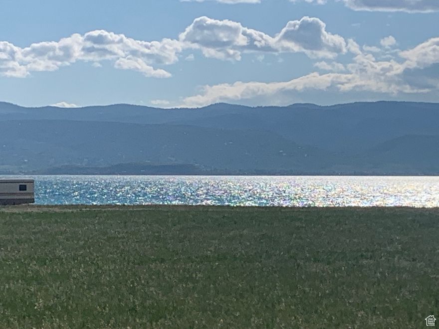 Eden Ranch is an exclusive, gated and paved waterfront community located on the beautiful east shore of Bear Lake with 36 large 1 acre-plus lots. Gated and paved with four season recreation and easy access to the lake for all water sports as well as to the hills for UTV/ATV, mtn biking trails in the east mountains.  The topography  of the lake at Eden Ranch provides for a consistent beach regardless of lake level changes. Lot 33 is a corner lot with unobstructed views of the lake. Walk to the boat ramp and pickleball courts. Nightly rentals allowed.