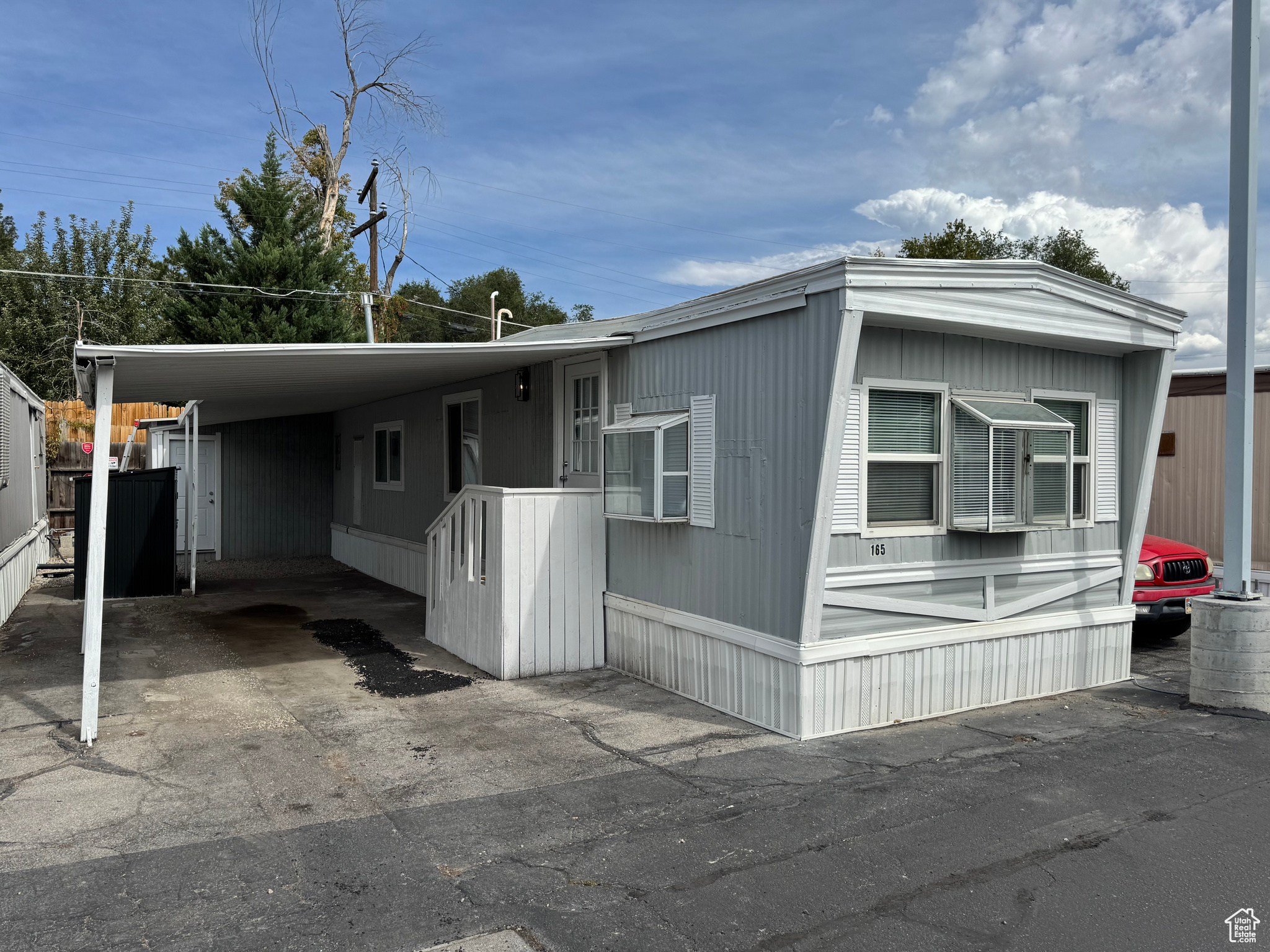 This remodeled mobile home features 3 BDRMS., 1 with a private entrance, brand new kitchen, New flooring, and paint. Located downtown, it offers easy access to amenities. Central air ensures year-round comfort. Perfect for modern living .move in ready