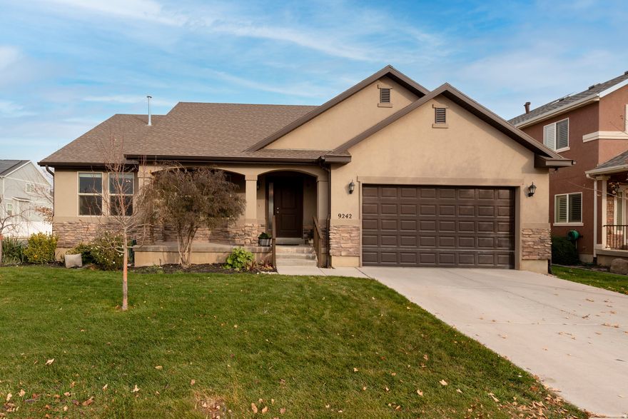 Welcome home! Step into this immaculately maintained 3,400 sq. ft. Eagle Mountain rambler - move-in ready and full of charm. The open layout features a spacious kitchen and living area, perfect for gatherings or quiet evenings by the cozy fireplace. Natural light fills the home, highlighting its warm and inviting atmosphere. Outside, enjoy mature fruit trees and raised garden boxes ready for your favorite homegrown recipes. The large primary suite offers a walk-in closet and plenty of room to unwind. Downstairs, you'll find a partially finished basement with a bathroom and two bedrooms. There is room for a home theater, gym, office, or play area - the possibilities are endless. Located near the future Mountain View Corridor exchange, you'll soon have quick access to anywhere you need to go. Shopping, parks, and schools are just minutes away. Come see why this home is the perfect blend of comfort, space, and convenience! Square footage figures are provided as a courtesy estimate only and were obtained from county records.  Buyer is advised to obtain an independent measurement.