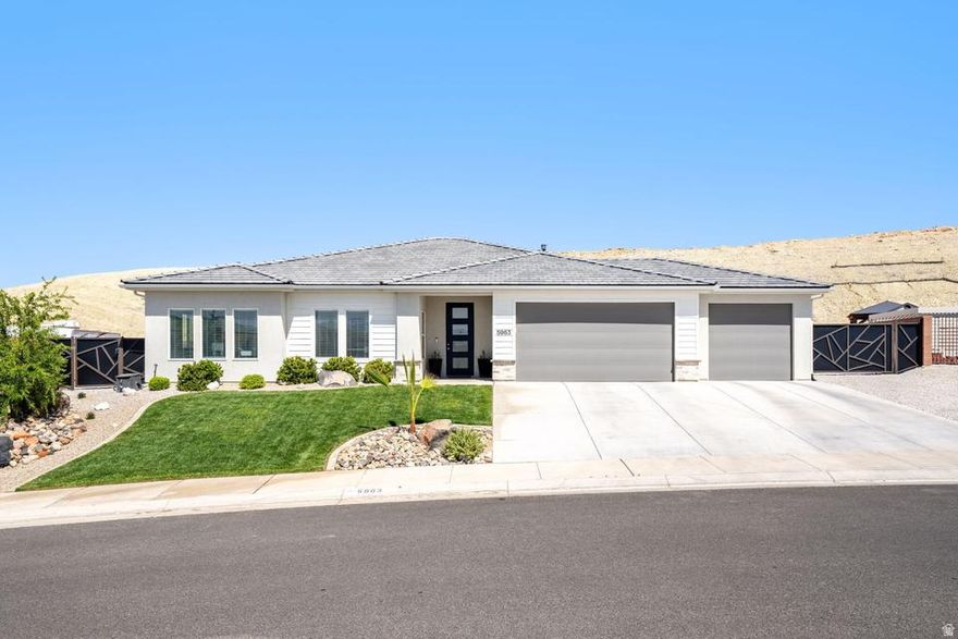 Enjoy the perfect blend of modern comfort, privacy, and adventure in this beautifully upgraded Southern Utah home surrounded by Pine Valley views and endless outdoor recreation. Thoughtfully designed with bright, inviting finishes throughout, the interior features oversized guest bedrooms, and a spacious primary suite with an enormous walk-in closet and gorgeous tile shower. The stunning kitchen is highlighted by quartz countertops throughout, light white and brown cabinetry, and beautifully upgraded higher-end finishes that create a clean, modern, and luxurious feel. The beautifully finished laundry room with matching quartz surfaces adds both style and functionality. Car enthusiasts and outdoor adventurers will love the oversized 3-car garage, super deep side RV and trailer parking that can easily accommodate multiple trailers and toys, plus a hardwired Level 2 electric car charger. Step outside to a peaceful backyard retreat that backs to a hillside, creating exceptional shade, privacy, and stunning Pine Valley views with no highway noise to interrupt the tranquility, all while being walking distance to the brand-new Southern Hills Park, the upcoming tech high school, and next door to world-class mountain biking, hiking, and off-road trails. Buyer to verify all information, deemed reliable, however buyer to verify all info including utilities, rental restrictions, and HOA information if applicable.