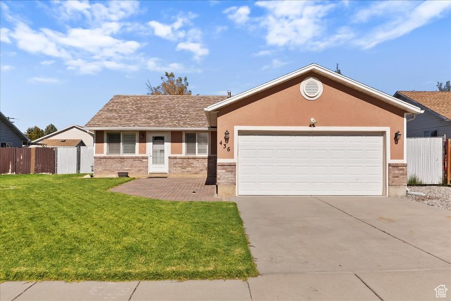 Don't miss this charming single-level home featuring 3 spacious bedrooms, 1 bath, and a large yard perfect for outdoor living! The kitchen is equipped with stainless steel appliances, while the cozy living room boasts a charming fireplace-ideal for relaxing evenings. Home is South Facing and Conveniently located within walking distance to public transportation, Walmart, and an auto service center, offering ultimate convenience right at your doorstep. Enjoy breathtaking mountain views and the comfort of a home that's close to all your daily essentials. Schedule your showing today!