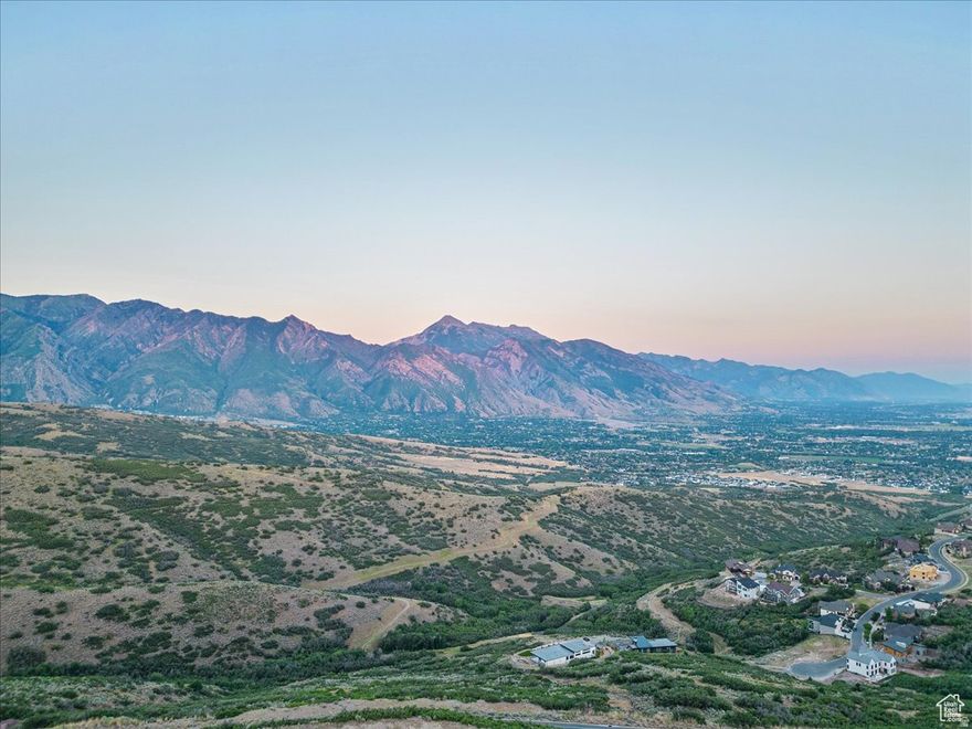 Build your dream estate and enjoy unobstructed views of Utah Lake, Mt. Timpanogos, and Lone Peak in Draper's Mountain Community of SunCrest.  The abutting conservation easement to the South ensures the only back yard neighbors you will ever have are abundant mountain wildlife. Listing includes four lots which can be combined for a total of .72 acres.  This location offers a rare opportunity to build where captivating scenery takes center stage, while offering the convenience of easy commutes: 8 minutes to I-15, 30 minutes to the international airport and downtown Salt Lake City, 35 minutes to world class skiing/riding. The allure of this property extends beyond its stunning views and location. With world-class hiking and mountain biking from your door, don't miss the opportunity to call this mountain paradise your own. Embrace a lifestyle defined by extraordinary views and serenity. This listing includes tax IDs 38-334-0107, 0106, 0105, and 0104.  Initial GeoTech Engineering report is attached to the MLS. Available information indicates stabilization required of these lots.  All info provided as a courtesy. Buyer/Buyer's Agent to verify all.