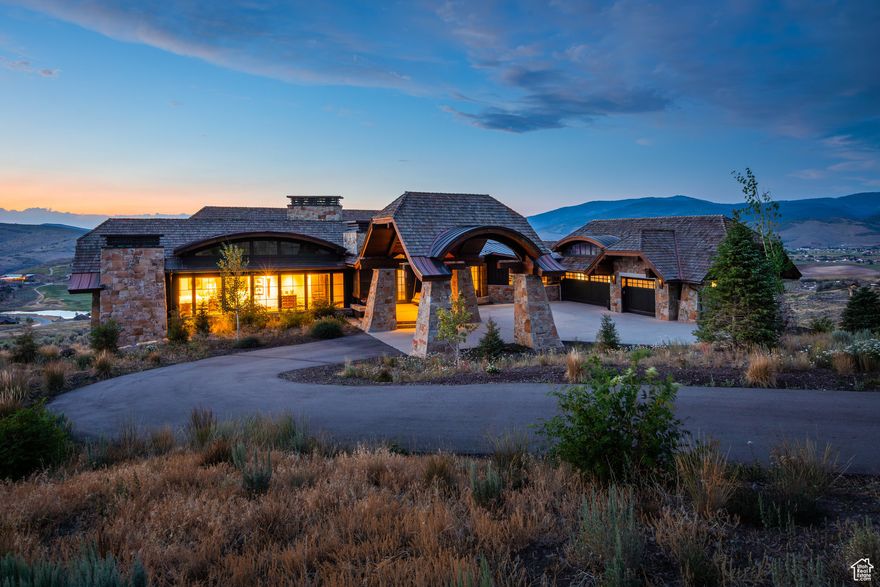 Welcome to your mountain sanctuary in the exclusive Victory Ranch community. Perched on a premier homesite, this custom-designed residence offers sweeping, unobstructed views that stretch from the iconic slopes of Deer Valley Resort to the acclaimed fairways of the Rees Jones-designed golf course, tranquil ponds,  the one-of -a-kind rock cliffs, and the peaks of the Uinta Mountains. Enjoy both sunrise and sunset from the comfort of your expansive outdoor living spaces-coveted views found only from this outstanding property. Crafted with impeccable attention to detail, the home seamlessly blends refined mountain architecture with warm, contemporary finishes. Vaulted ceilings, expansive window walls, and thoughtfully designed indoor-outdoor flow capture the surrounding landscape in every room while invoking a welcoming place to come home to. Whether entertaining under the stars or enjoying memorable times with family and friends, this home offers an extraordinary lifestyle rooted in privacy, luxury, and year-round adventure.  Victory Ranch amenities include world-class fly fishing, backcountry trails, a private ski-in/ski-out lodge in Park City, and a vibrant community unlike any other. This is more than a home-it's a legacy property for you and your family.   Victory Ranch is a private, four-season community amidst 6,250 pristine acres along four miles of the Upper Provo River. Amenities include an 18-hole Rees Jones golf course, world-class fly-fishing, miles of mountain biking and hiking trails, 5-stand shooting facility, 4x4 adventures, snowmobiles, backcountry yurts, fishing ponds, restaurants, a ski-in/ski-out lodge in Park City and more than 3,500 acres of untouched backcountry. The Barn features a pizza parlor, art studio, game room, indoor basketball court as well as a fitness center, spa, platform tennis Courts. The swimming pool, waterslide, tennis and pickleball courts and seasonal ice skating rink will be sure to provide hours of family fun. Victory Ranch is approximately 20 minutes to Park City.