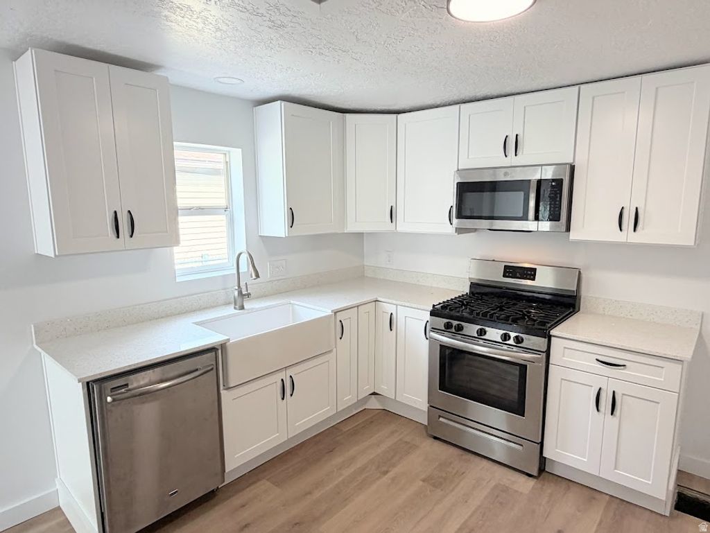 Photo of 625 W 4TH AVE, Midvale, UT 84047 (MLS # 2163989)