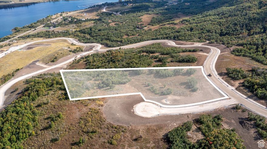 Welcome to your dream homesite in the heart of Eden UT. This exceptional 5.43-acre ranch lot is tucked within the sought-after Osprey Ranch community, where expansive views and peaceful mountain living come together. Perched along a scenic ridge, the property offers breathtaking panoramic views of Ogden Valley, with direct sightlines to Pineview Reservoir and the surrounding alpine peaks. Set in a thoughtfully planned community that balances open space, natural beauty, and privacy, this lot provides the ideal canvas for your custom mountain retreat. Whether you're soaking in the sunrise over the valley or watching the sunset behind the mountains, every direction delivers a postcard-worthy view. Recreation abounds in every season. Nordic Valley is just 4 miles away, Powder Mountain is 8.5 miles, and Snowbasin Resort is only 13.5 miles from your doorstep. Downtown Ogden, with its restaurants, shopping, and historic charm, is an easy and scenic 20-minute drive. To truly appreciate the full 360-degree views and unique setting of this property, visit: https://www.osprey-ranch.com/ranch. Boundary lines are provided as a courtesy estimate only. Buyer is advised to obtain an independent measurement.