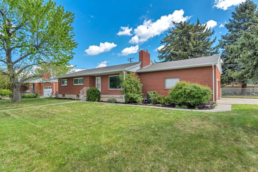 Fully remodeled 5-bedroom home in the heart of Sandy! Enjoy unbeatable convenience with nearby shopping, parks, and easy freeway access. The home includes a separate basement entrance with second kitchen and laundry, making it ideal for mother-in-law apt or an ADU.  Spacious corner lot with mature landscaping and amazing mountain views.