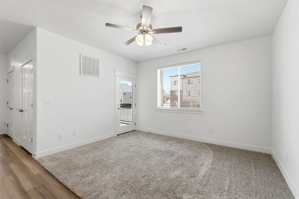 Photo of 13528 S COMMODUS DR W #L202, Riverton, UT 84096 (MLS # 2142911)