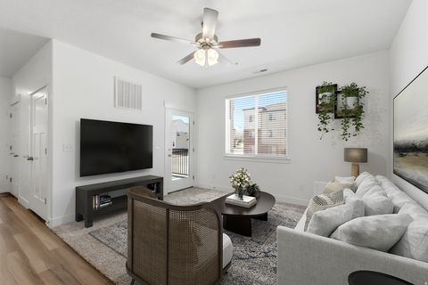 Photo of 13528 S COMMODUS DR W #L202, Riverton, UT 84096 (MLS # 2142911)