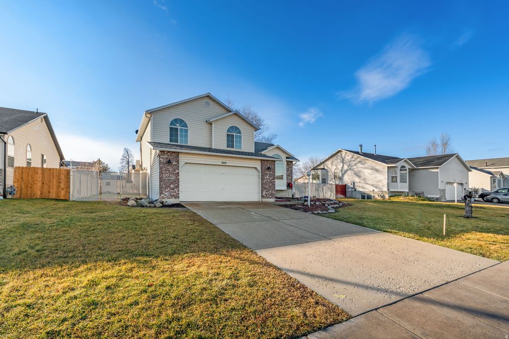 Photo of 2045 W APPLE FARMS RD, West Valley City, UT 84119 (MLS # 2129898)