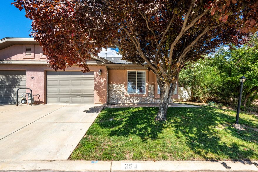Welcome to this charming and comfortable home in the sought-after Cottages North community. This well-maintained unit offers a smart floor plan, easy one-level living, and all the essentials you need without any sacrifice. Step inside to a warm interior featuring abundant natural light and functional living spaces. The kitchen opens to the living areas, creating a welcoming flow. Two bedrooms and two bathrooms with a designated laundry room. New air unit and furance has been installed! Outside, enjoy low-maintenance landscaping and community amenities such as an outdoor pool. Located close to shopping, dining, recreation, and all that St. George offers, this home blends convenience, comfort, and community in one package.