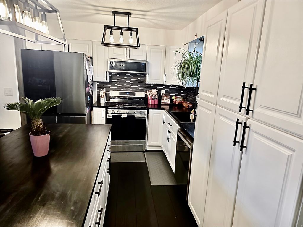 Photo of 2897 W 5875 S, Roy, UT 84067 (MLS # 2153027)