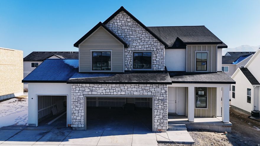 Brand-New Homes in Eagle Mountain! The Roslyn floor plan- 2 Story featuring:  4 bedrooms, 2.5 baths- Black windows on exterior Soaring 2-story family room with elegant Black Metal railing. Custom Cabinetry and quartz countertops Spacious 3-car garage.  Yes it has a Fireplace.  Exclusive Offer! Get $20,000 toward closing costs-available for using our preferred lender. This one will finish mid February 2026 and just check out the finishes in this home, this is not a tract home. Call for your personal showing!