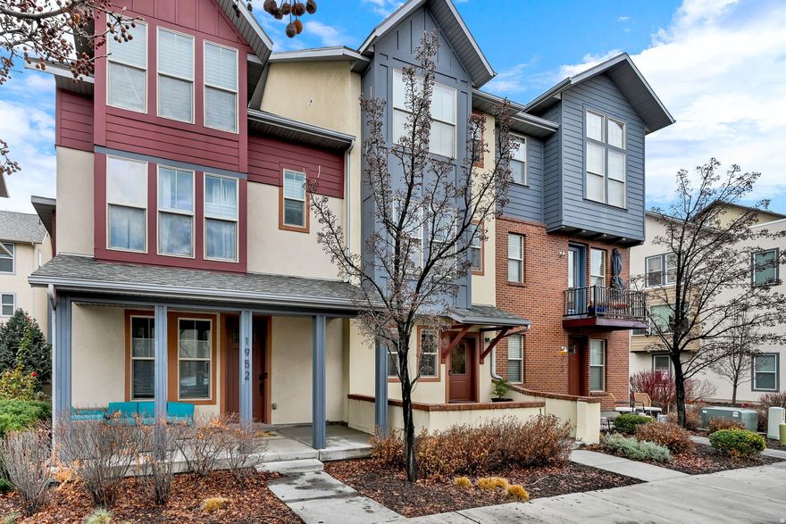 Ideally located in the heart of Ogden, this well-maintained townhome is steps from the Ogden River Parkway, Historic 25th Street, and The Junction. Features include two owner's suites with private baths, granite countertops, spacious closets, and upper-level laundry. The open main level offers a bright living area, kitchen with granite and ample storage, and access to a covered deck. Includes a front patio, tandem two-car garage, and a 1-year home warranty. Square footage is a courtesy estimate; buyer to verify.