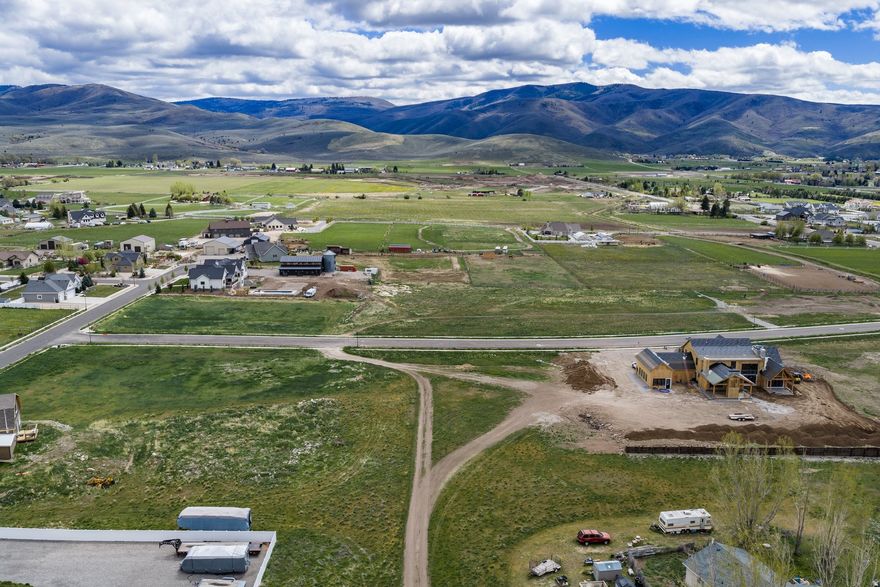 The Flying Hawk subdivision is located on the east side of Heber Valley at 2400 East and 1200 South.  It is a 9 lot development with lots ranging from .77 acres to 2.5 acres and priced from $495,000 and up.  Each lot has full irrigation rights to keep your landscape green and fresh. The lots over an acre has animal rights.  Each lot has great views, including Mt. Timpanogos, Snake Creek Canyon, and the surrounding mountain ranges. You are just minutes from Heber Main Street, and only 45 minutes from SL International Airport.  Enjoy the amenities of beautiful Heber Valley, including 90 holes of championship golf, water sports on the Deer Creek and Jordanelle Reservoirs, Blue Ribbon fishing on the Provo River, and World Class skiing on the slopes at Park City, Deer Valley, Canyons, and Sundance Resorts...all within 20-30 minutes. This is a great place to live and build your Dream Home.