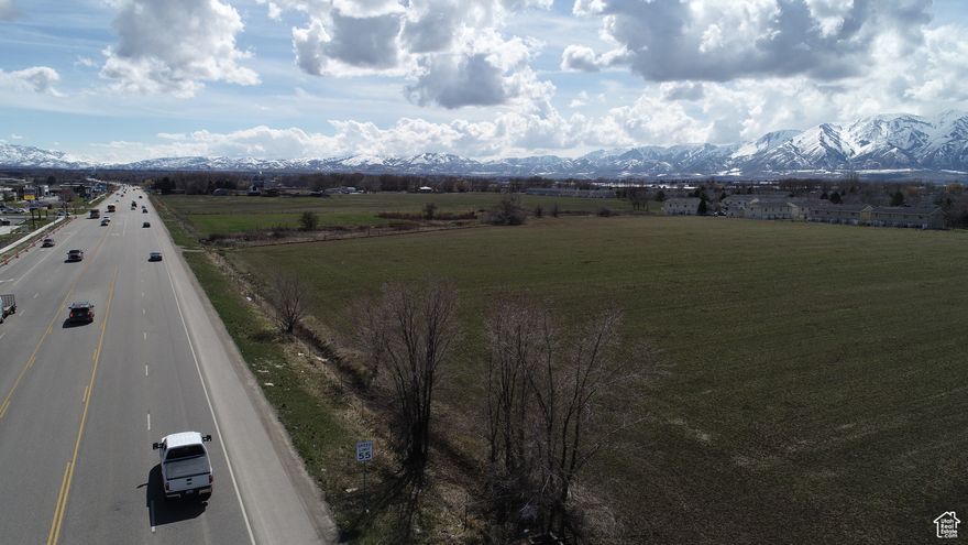 Prime Commercial Land Three Parcels for a total of 17.46 Acres Total price for all three parcels $6,500,000.00 Will Divide. Must agree to interconnectivity with surrounding land parcels.  Zoned Highway Commercial in Providence, irrigation water included.