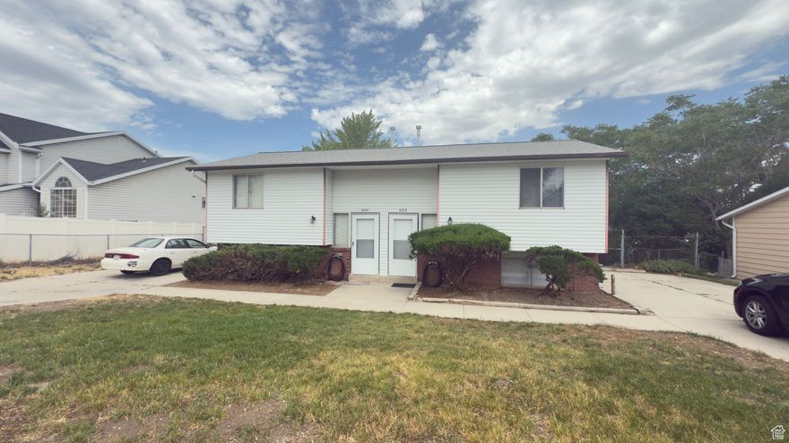 Step into comfort and style with our newly remodeled duplex, featuring 2 spacious bedrooms and 1.5 modern bathroom. Fresh paint and new carpeting throughout create a welcoming atmosphere, while the stainless steel fridge adds a touch of elegance to your culinary experiences. The large backyard, adorned with mature trees, offers a serene retreat and ample space for outdoor activities. Plus, with RV parking available, this home caters to all your needs. Enjoy the convenience of included water and sewer services, making this duplex not just a house, but a place you can truly call home! Square footage is approximate. Applicant to verify all information.